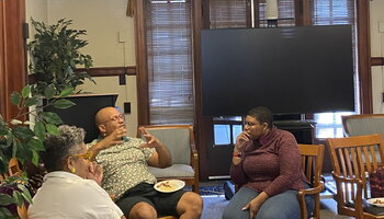 Faculty having a discussion
