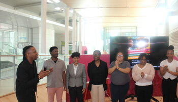 Group photo of 6 students & Professor Bobby J Smith