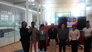 Group photo of 6 students & Professor Bobby J Smith