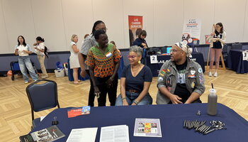 African American Studies Faculty at the department table for the Humanities Open House