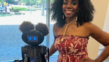 N1CØLE, wellness robot and Professor Ruby Mendenhall