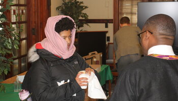 Student talking to faculty member