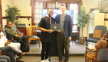 Certificate presented by Professor John Meyers to Professor Bobby J Smith II