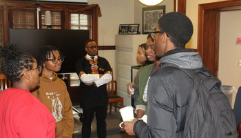Students and faculty chatting
