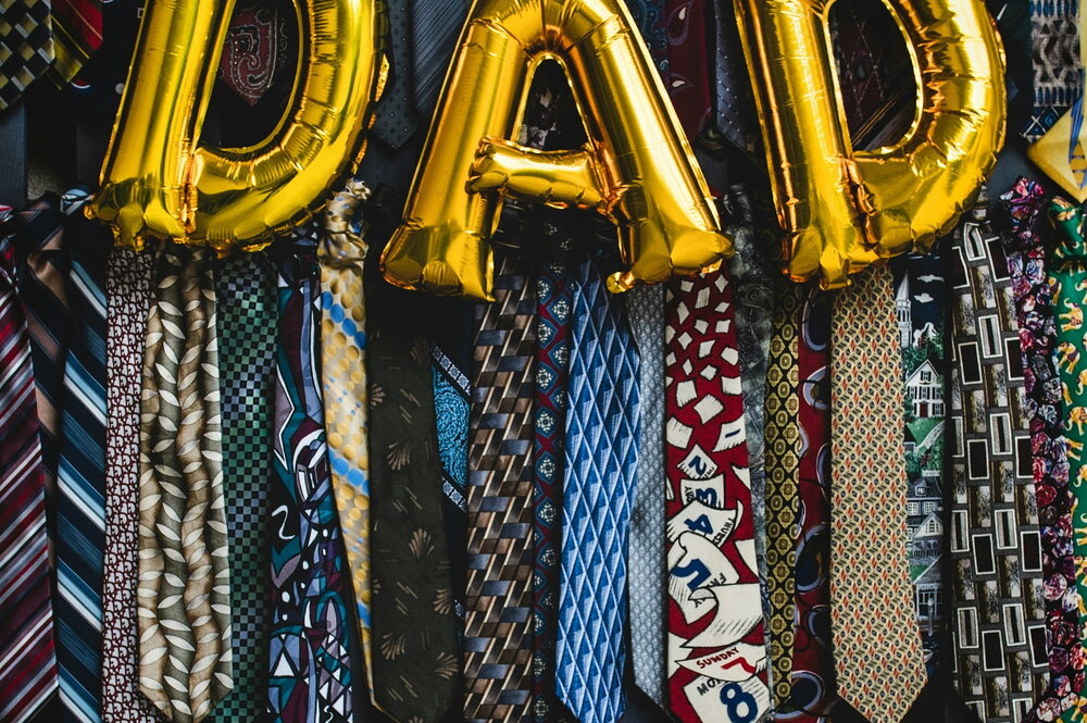 Dad balloon hanging from ties