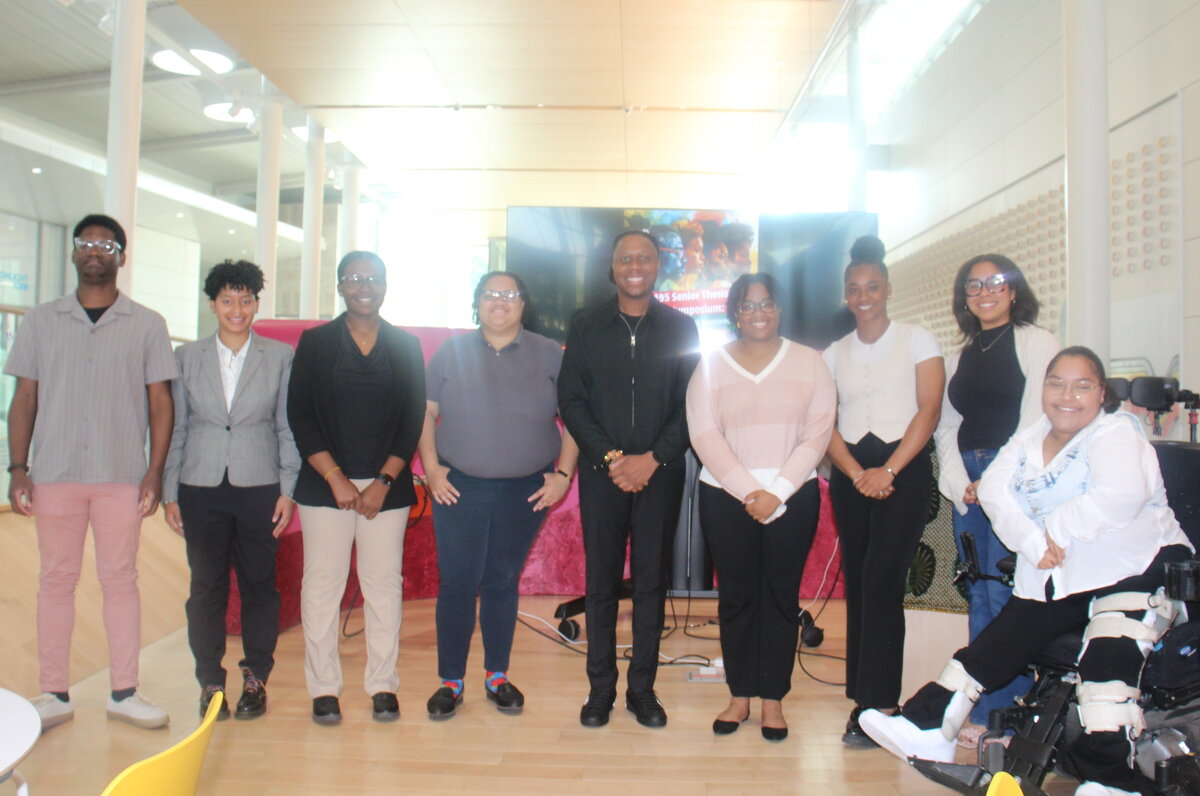 Group photo of 8 students and Professor Bobby J Smith II