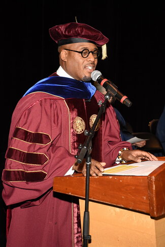 Professor Leonard McKinnis announcing at convocation