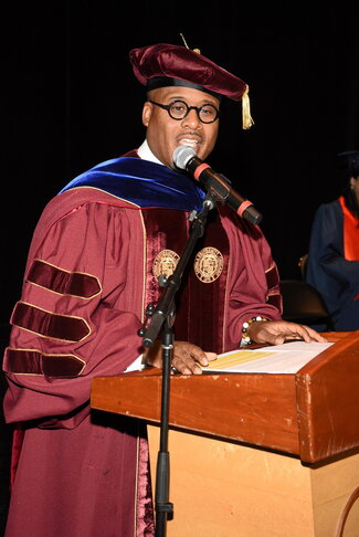 Professor Leonard McKinnis announcing at convocation