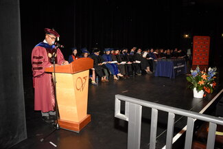 Professor Leonard McKinnis announcing at convocation