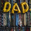 Dad balloon hanging from ties